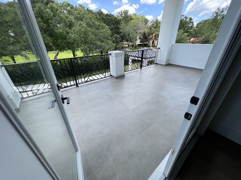Covered patio with tile floor