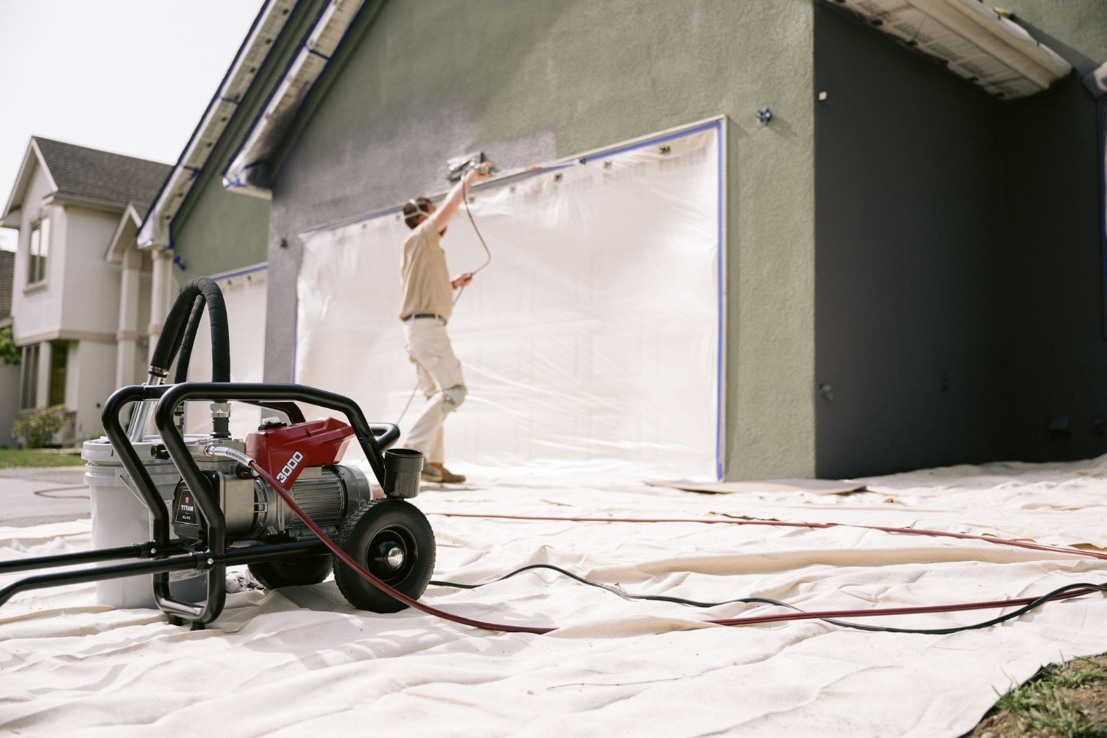 Exterior house painting in progress by HOMECRAFT